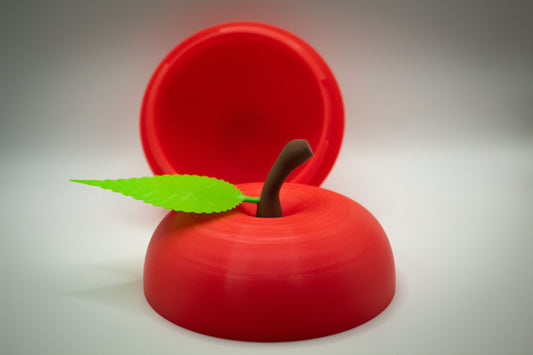 3D Printed Apple Container for Storage: Whimsical & Functional Decor open revealing storage space and realistic apple details.