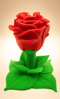 3D printed rose container for jewelry showcasing a vibrant red rose and green leaves, perfect for elegant storage.
