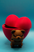 Bear Heart Jewelry Storage Container featuring a 3D-printed red heart-shaped box with a cute bear figure, ideal for storing keepsakes and gifts.