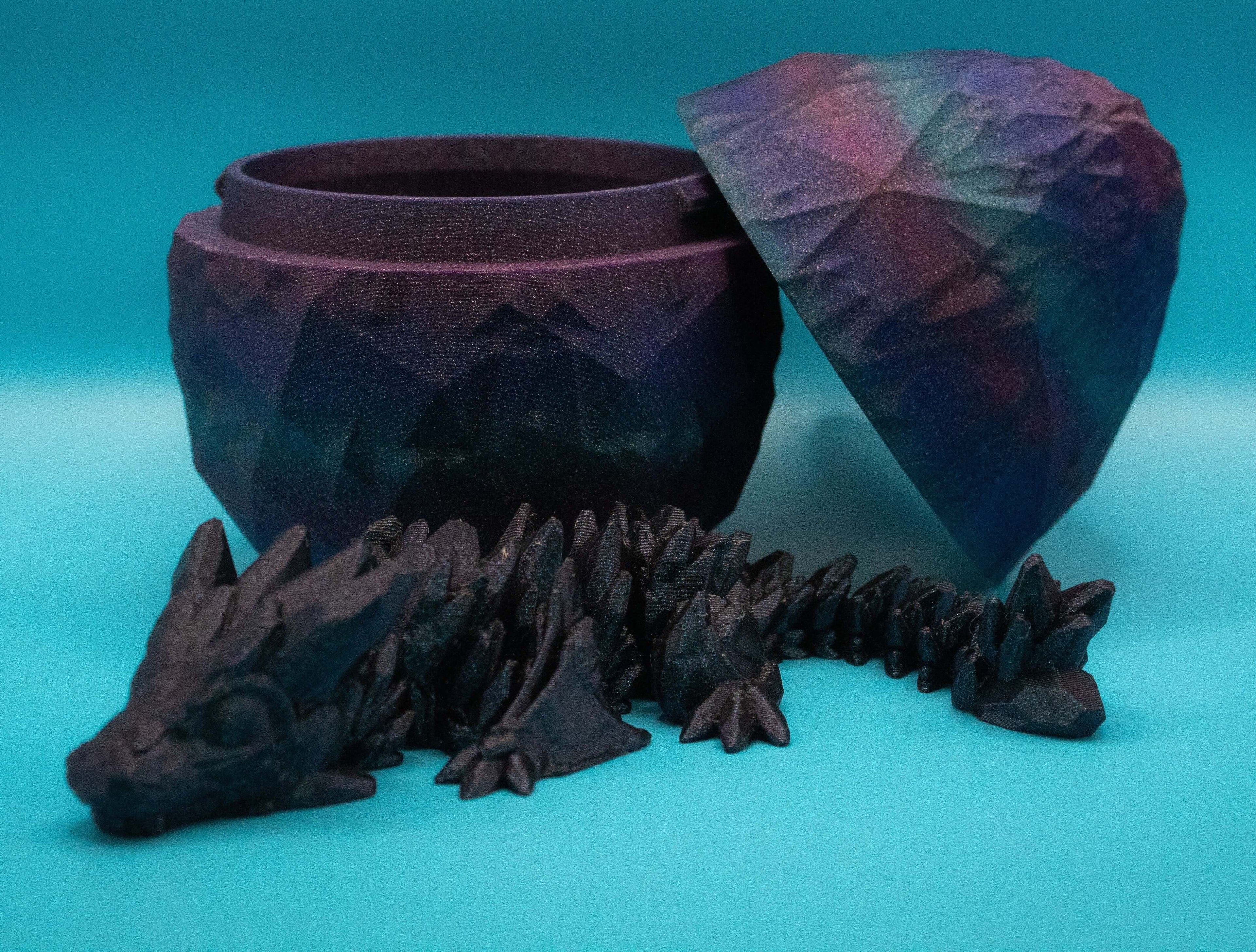 Galaxy Dragon Collectible Set featuring a 3D-printed articulated dragon figure with a matching cosmic egg container. Ideal for fantasy toy collectors.