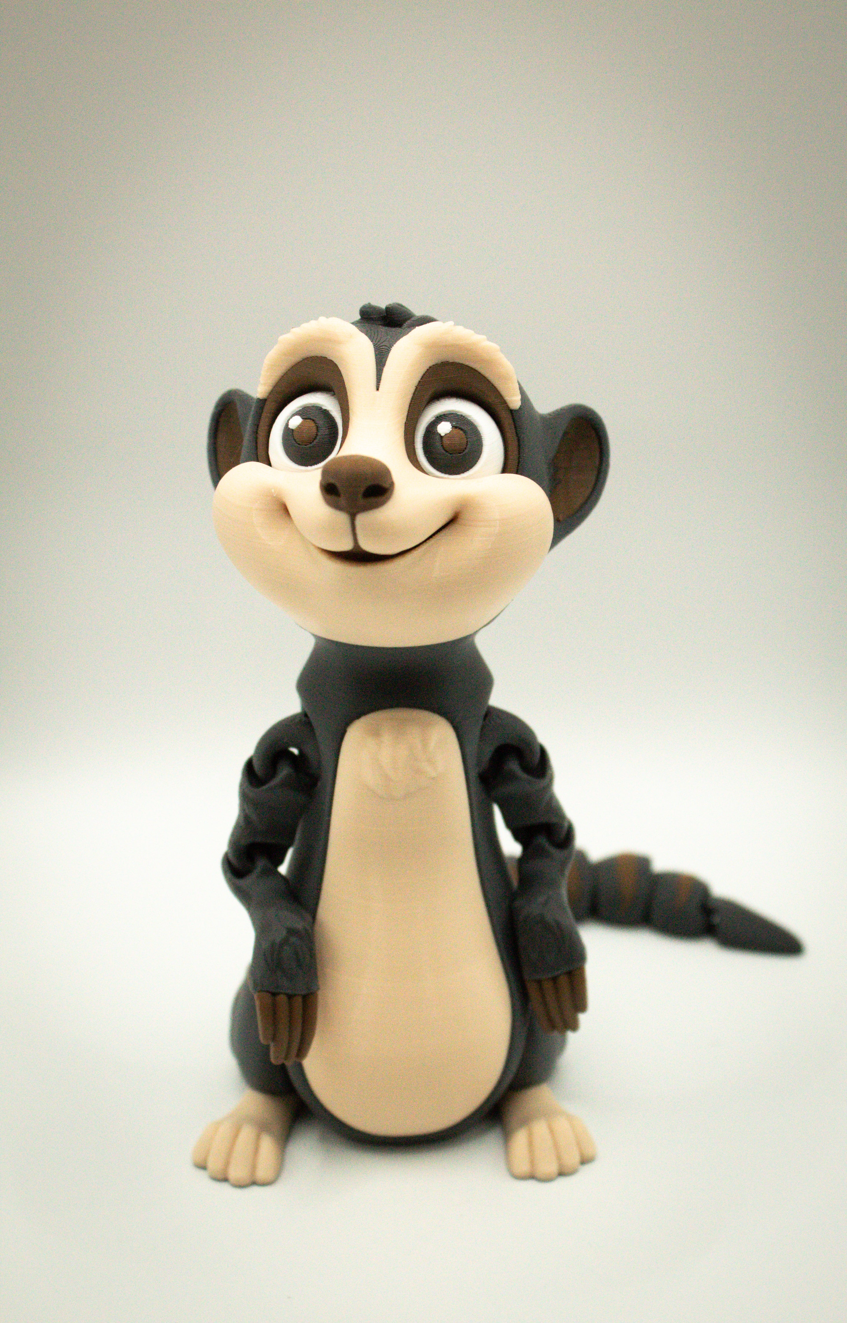 3D-printed meerkat collectible showing a charming, articulated meerkat figure with a playful expression.